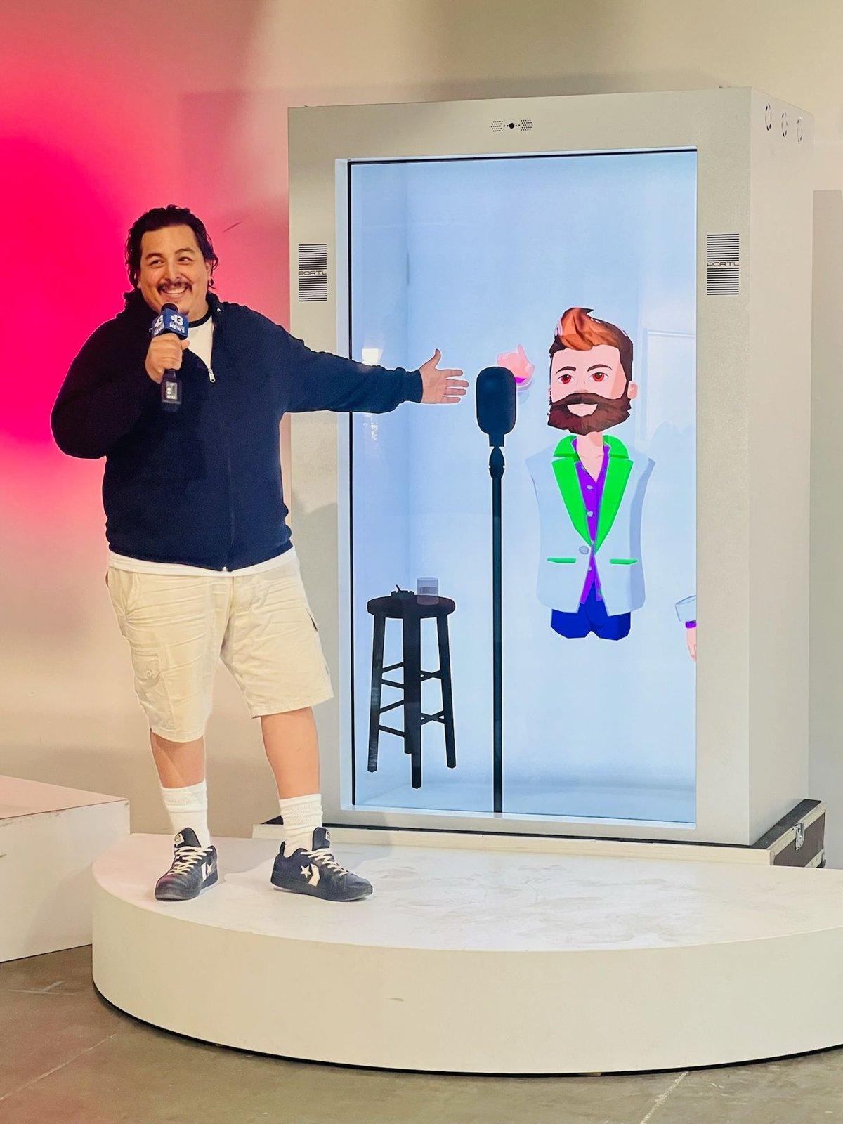 KTNV reporter with the hologram booth